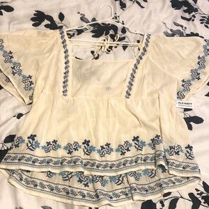 Old navy top with blue floral patterns